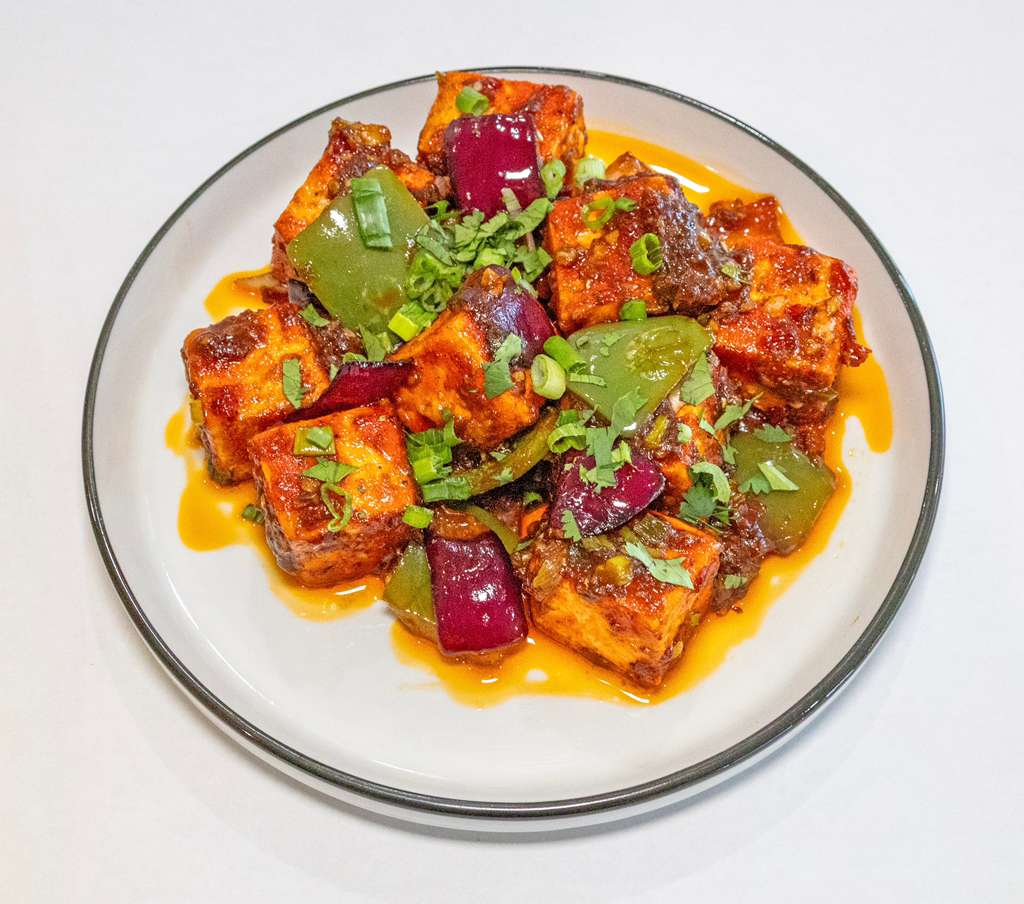 Indian cuisine spread — curries, rice, and naan